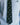 Black tie with magic 8 ball pattern on a light blue shirt